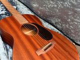 a guitar that is in a case on the floor