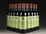 six bottles of red wine are lined up in a row