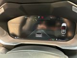 the dashboard of a car with a digital display on it