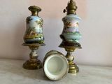 two vases that are sitting on a table