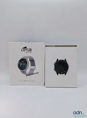 the box is open and the watch is in it ' s packaging
