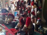 many stuffed animals on a table in a room