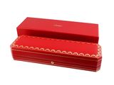 an image of a red box with gold trimmings on it