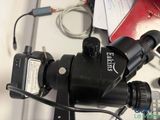 an image of a close up of a camera on a desk