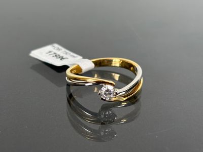 an image of a diamond ring on a black surface