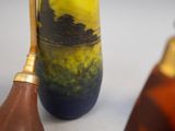 two vases that are sitting next to each other on a table
