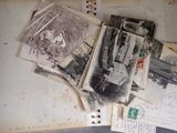 many old photos and letters on the table