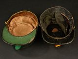 two hats that are sitting next to each other