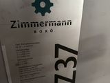 a sign on the side of a refrigerator that says zimmermann