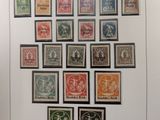a close up of a book with a bunch of stamps on it