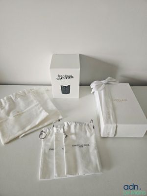 a white box and a white bag on a table