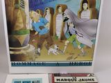 Trois livres pour enfants sont posés sur une table avec un fond blanc