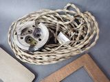 a rope that is being used to tie a light bulb