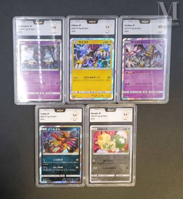 four different pokemon cards in plastic cases on a table