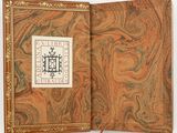 an old book with a picture of a gate on the cover