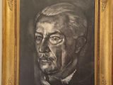 portrait of an old man with a cigarette in a gold frame