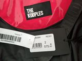 a label on a red jacket that says the koople