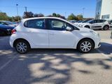 a picture of a white car parked in a parking lot