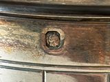 a close up of a metal object on a table