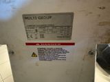 a sign on the door of a machine that says multi group