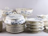 a lot of plates and cups on the table