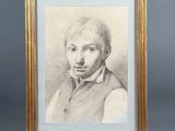 a drawing of a man in a vest and tie is shown in a gold frame