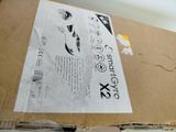 a cardboard box that has a picture of a cat on it