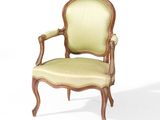 une image représentant une chaise dont l'assise est recouverte d'un tissu vert