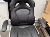 an image of a black office chair in a room