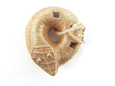 a donut that is sitting on a white surface