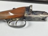 an old gun that is sitting on top of a table
