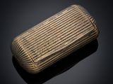 a close up of a wooden cigarette case on a black surface