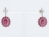 une paire de boucles d'oreilles en rubis et diamants