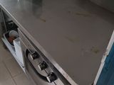 a stainless steel counter top in a commercial kitchen