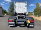 a truck that is parked on the side of the road