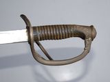 a close up of a sword with a metal handle