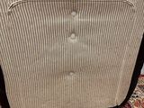 a suitcase that is sitting on a rug on the floor