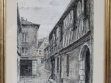 tableau représentant une scène de rue avec des bâtiments et une horloge, dans un cadre doré