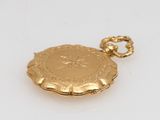 an image of a gold locke on a white surface