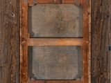 a picture of an old wooden cabinet with a glass door