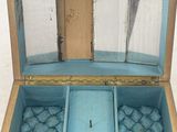 a small wooden box with two compartments inside of it