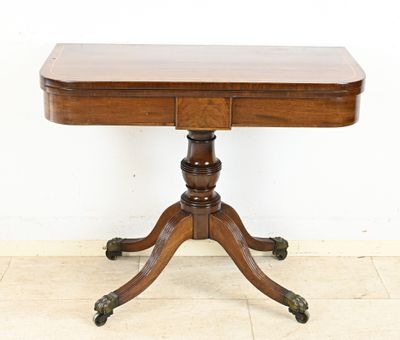 an old wooden table with a drawer on top of it