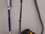 a vacuum that is sitting on a table next to a vacuum
