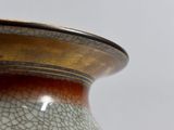 a close up of a vase with a cracky surface
