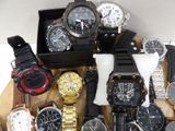 a lot of watches that are sitting in a box