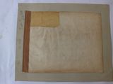 an old photo of a piece of paper with a piece of paper sticking out of it