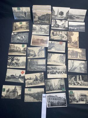 some old black and white photos of people and buildings on a table