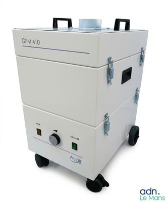 an image of a white machine sitting on top of a white table