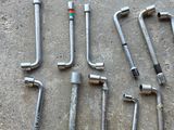 a lot of wrenches that are laying on the ground