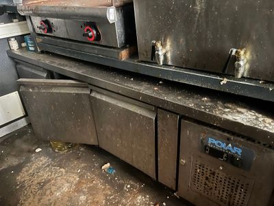 two ovens sitting on top of each other in a kitchen